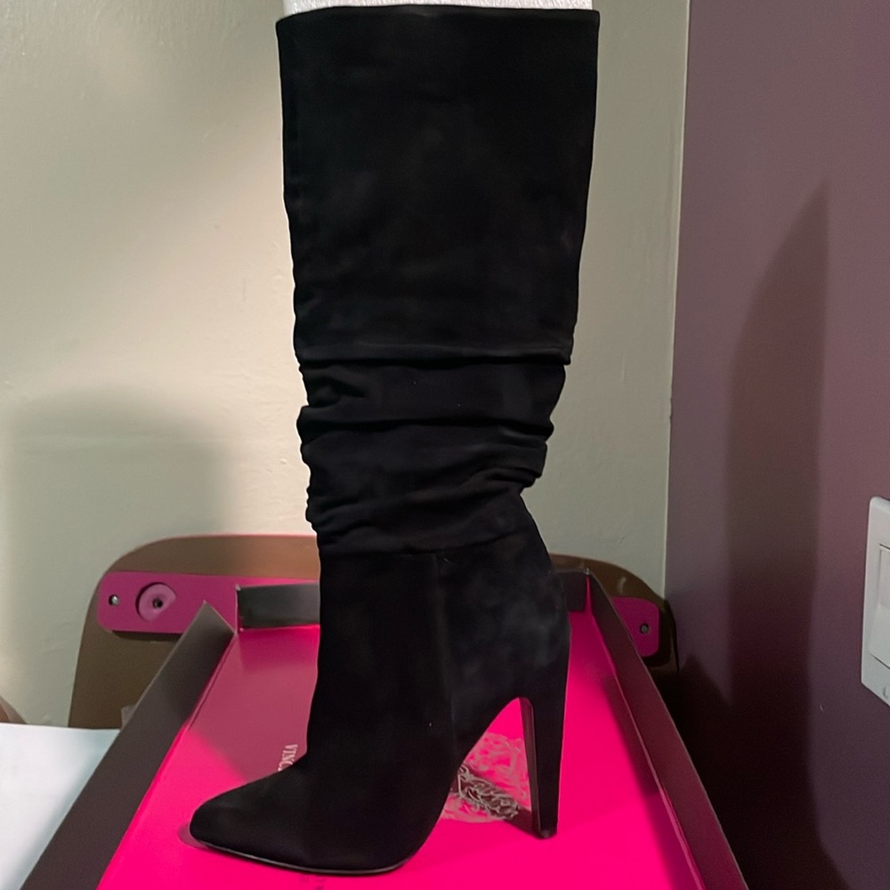 Women’s Steve Madden black slouch knee high boots. Size 7. Good condition.